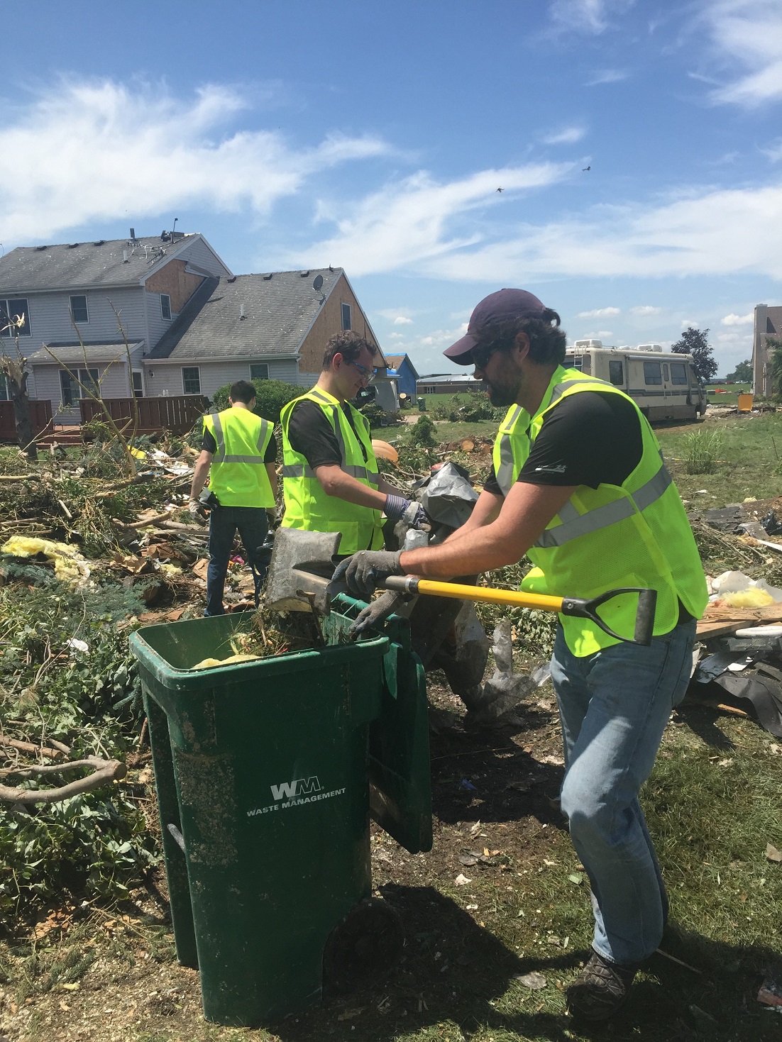 Clearing debris from residents' yards