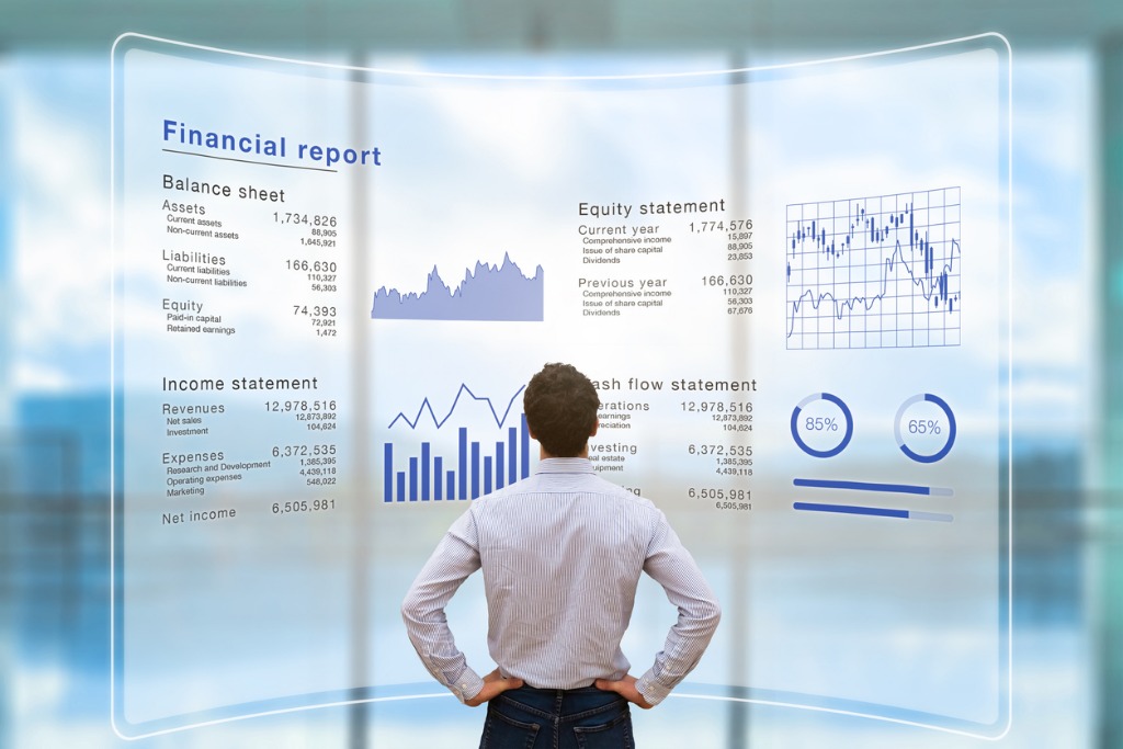 businessman analyzing financial report data company operations sheet picture id878863400