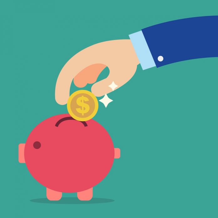 business hand holding coin into red piggy bank with green money vector id859271034 696x696 1