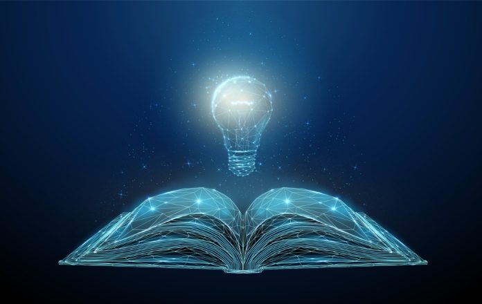 open book with a lightbulb