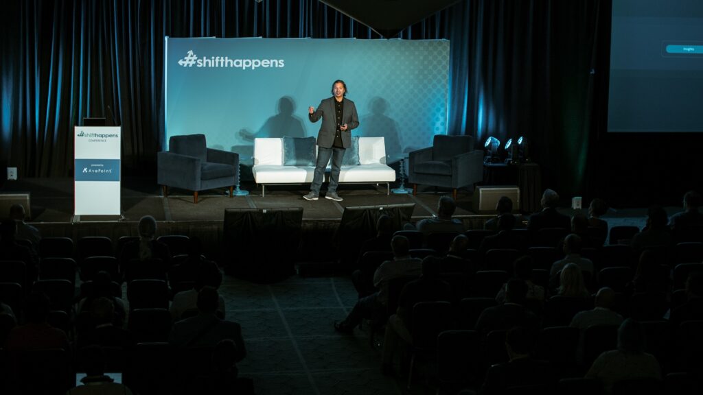 AvePoint Chief Product Officer John Peluso speaking at #shifthappens 2023